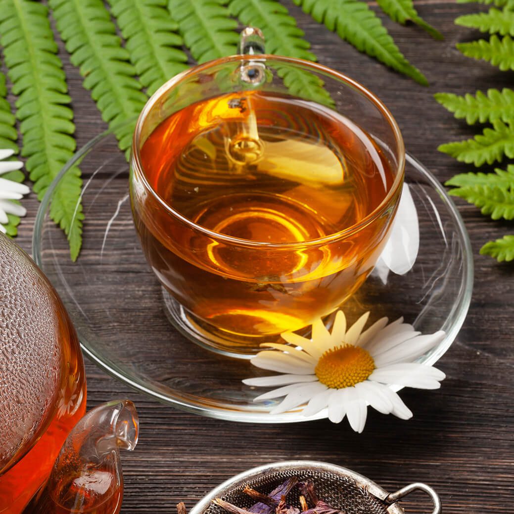 herbal-tea-in-teapot-and-cup-42JUAM8.jpg